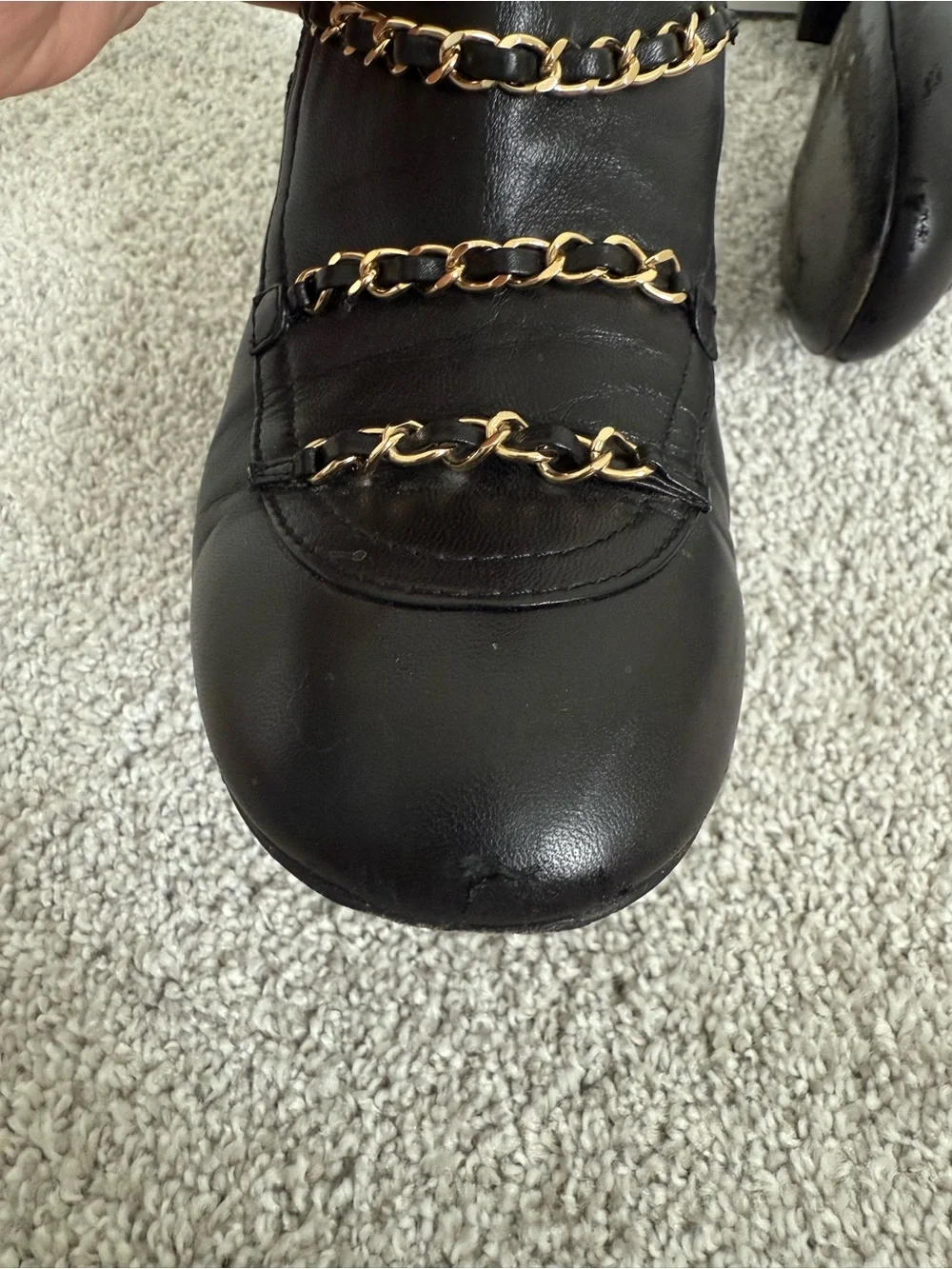 CHANEL Black knee-high lambskin leather boots